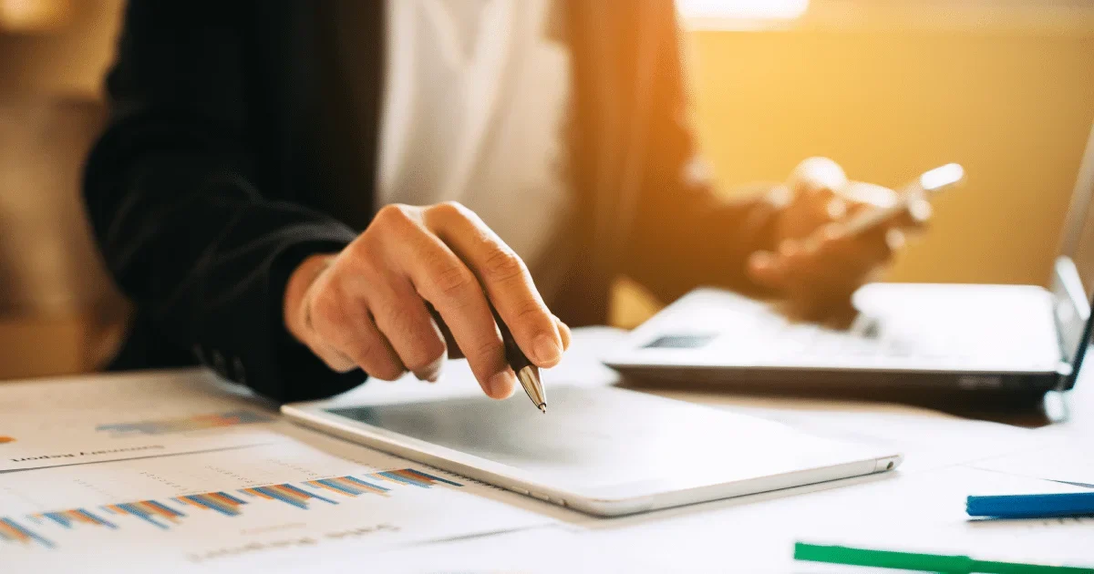 woman looking at financial records